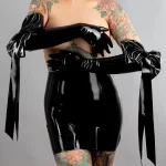 Latex wrist gloves with trim.